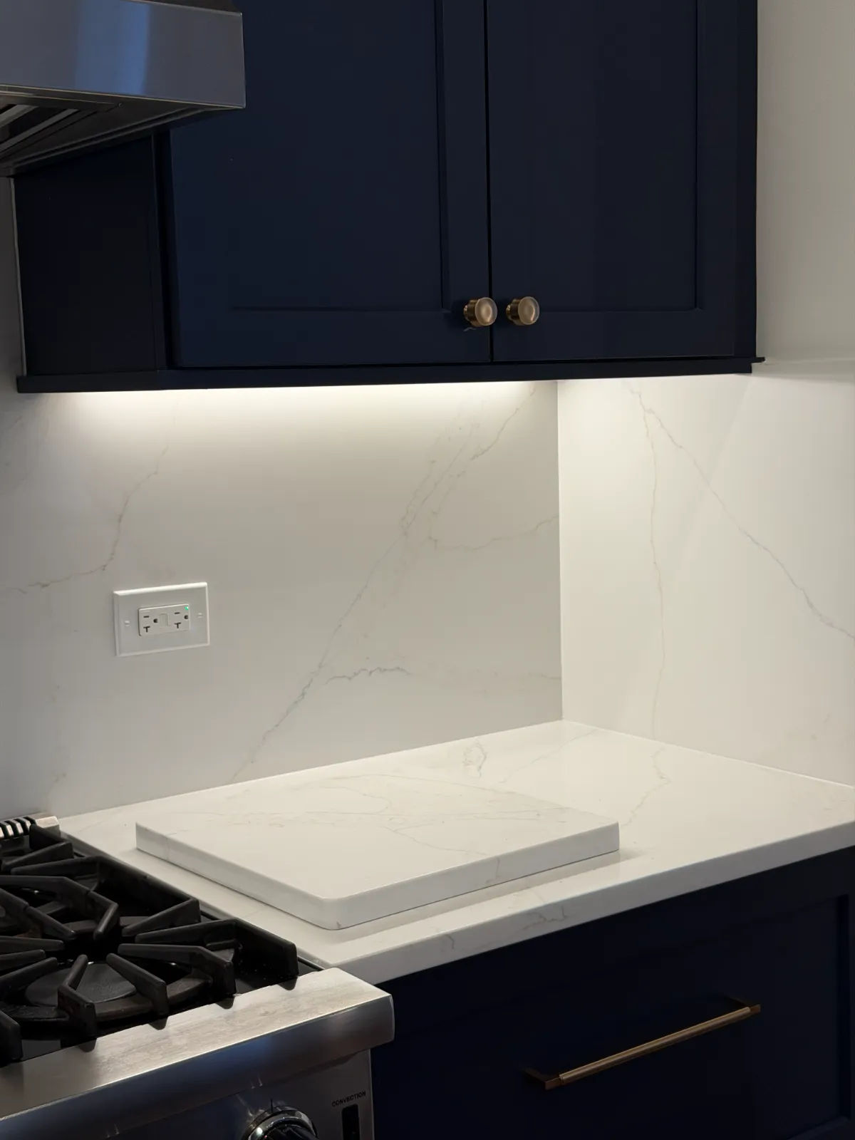 Navy kitchen with under-cabinet lighting Chicago