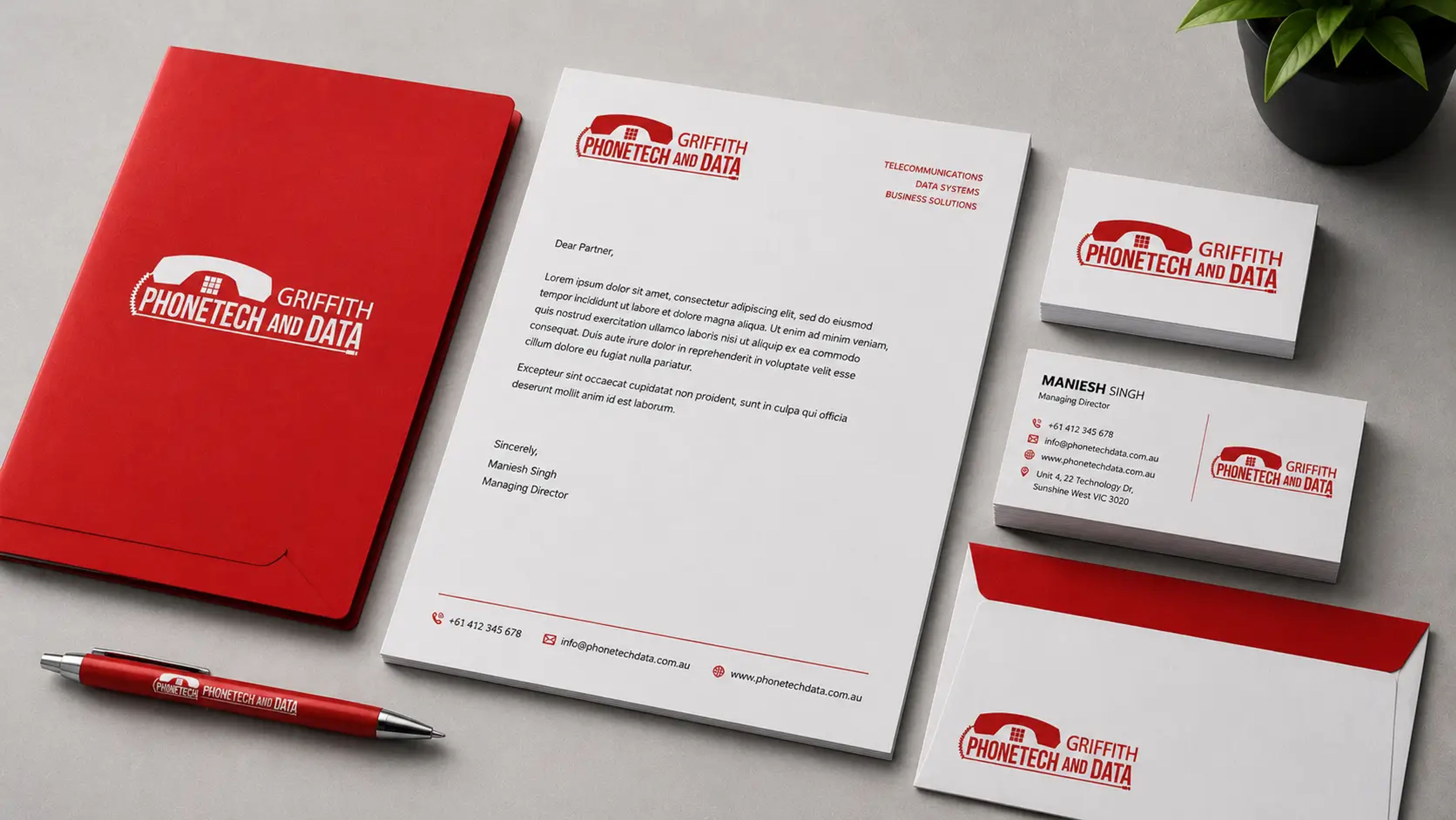 Griffith Phonetech & Data brand stationery mockup showing the logo applied to business collateral.