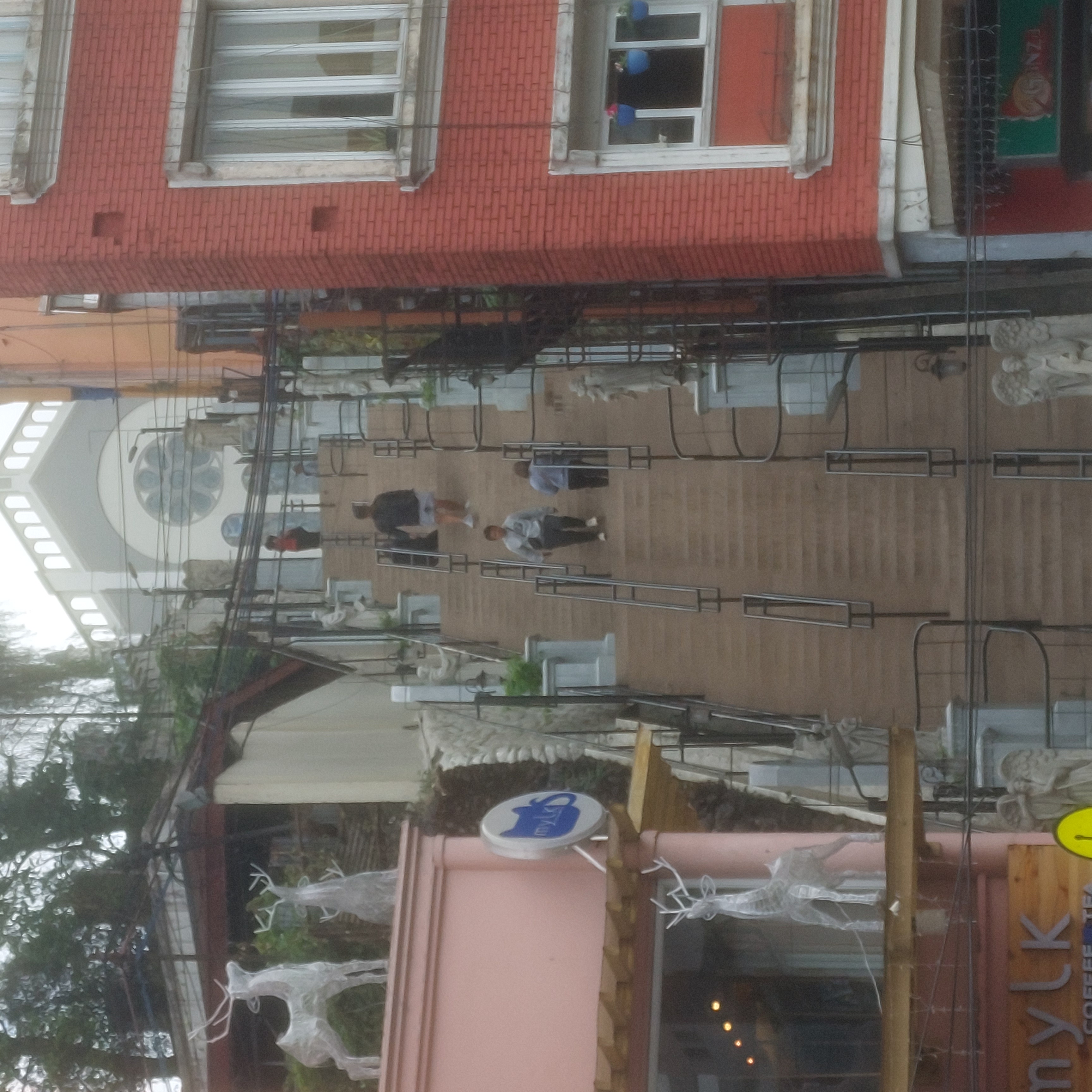 Very high stairs towards a church.