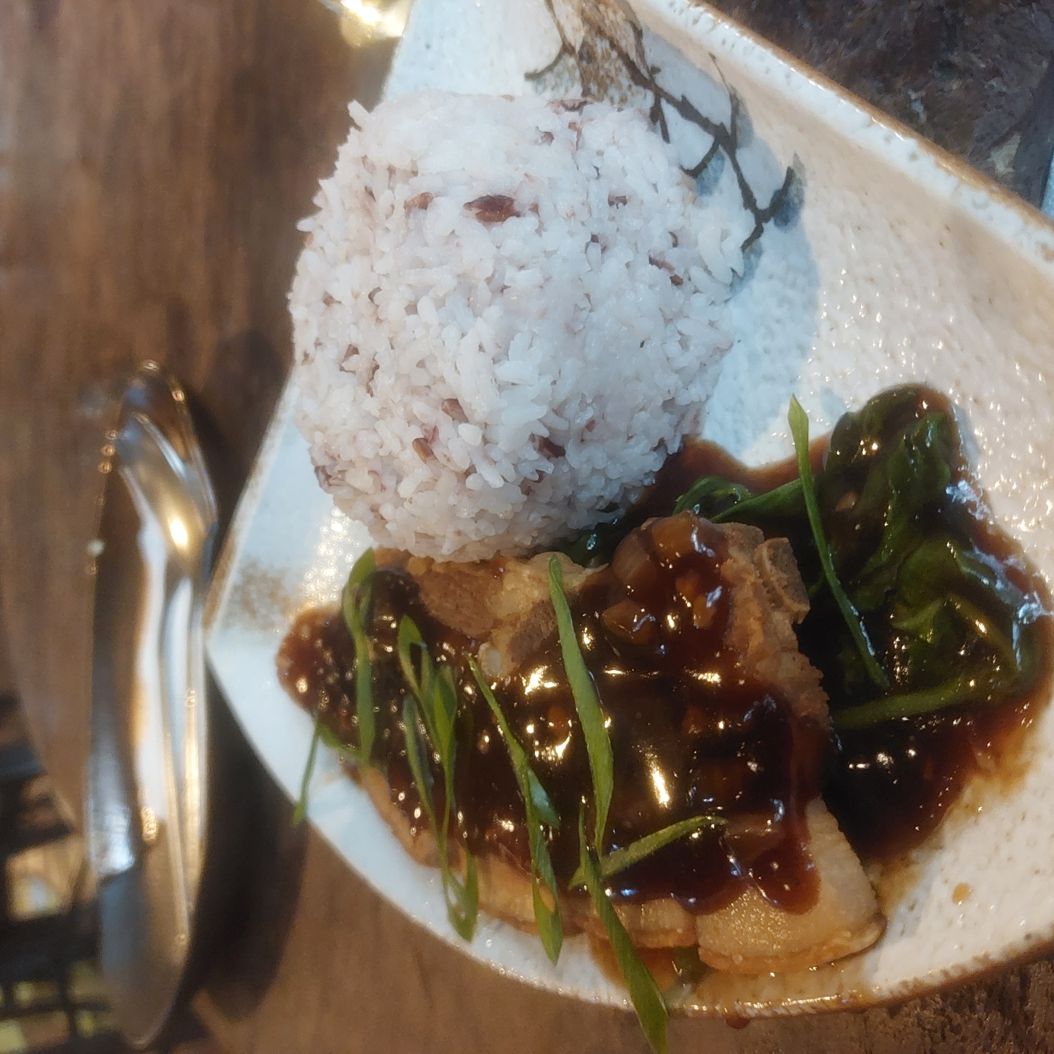 Braised lechon with rice.