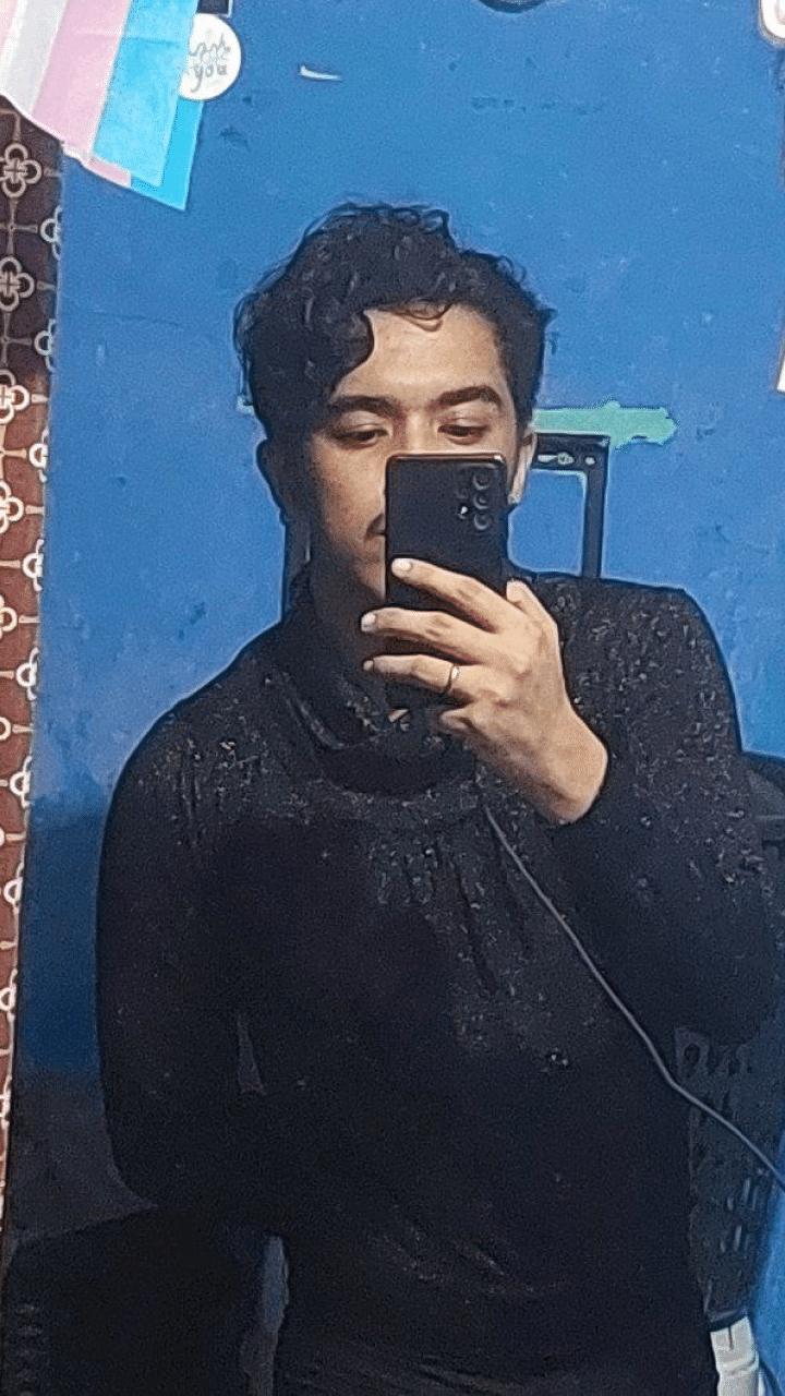 A mirror selfie of me wearing a black glimmering turtleneck shirt