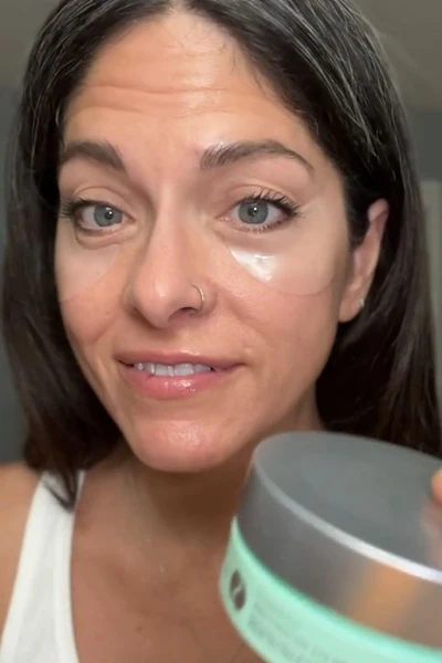 Elle applying Rejuvenating Eye Gels in Rejuvenating Eyes 30 Pair