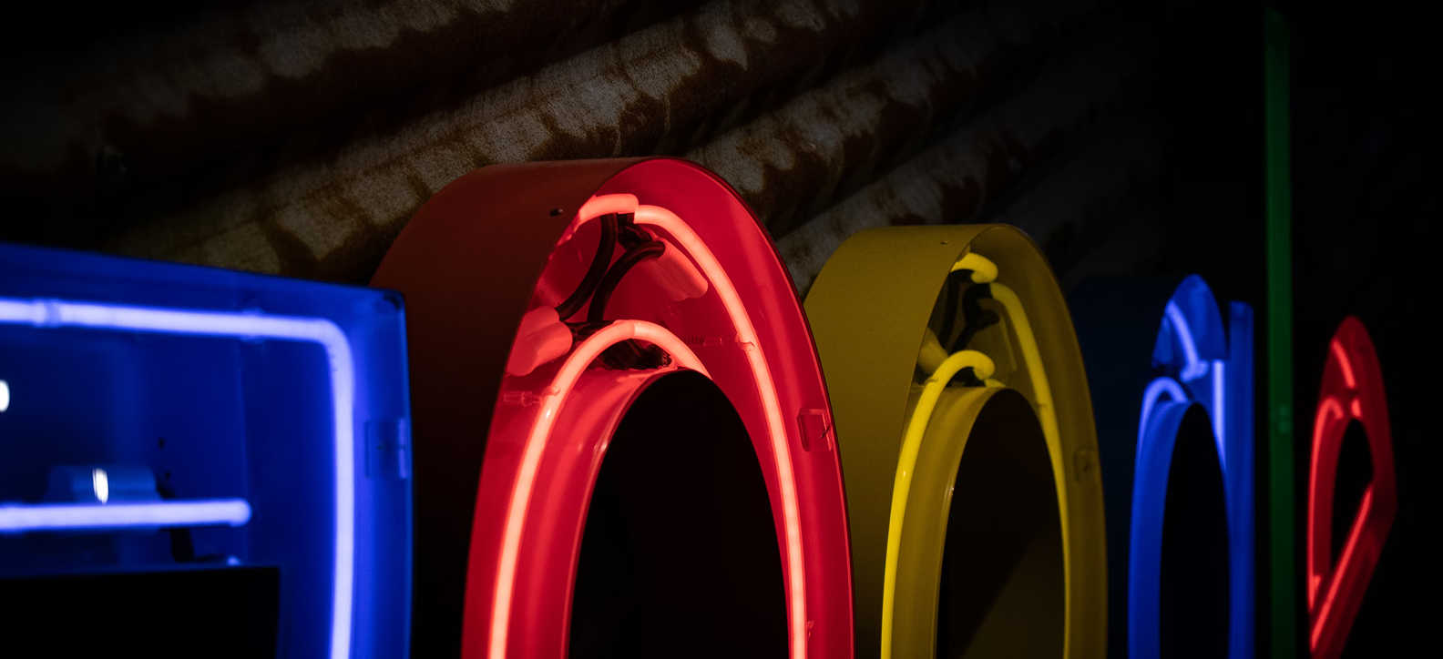 Abstract image of the top of the Google logo set against a black background