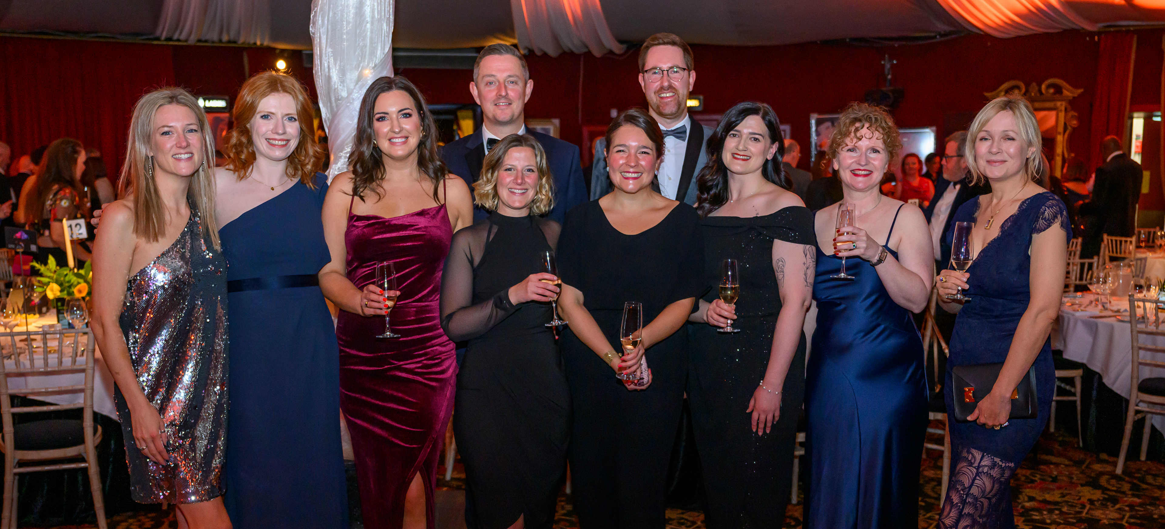 8 Million Stories team posing for a photo at the Cancer Card Ball 2024