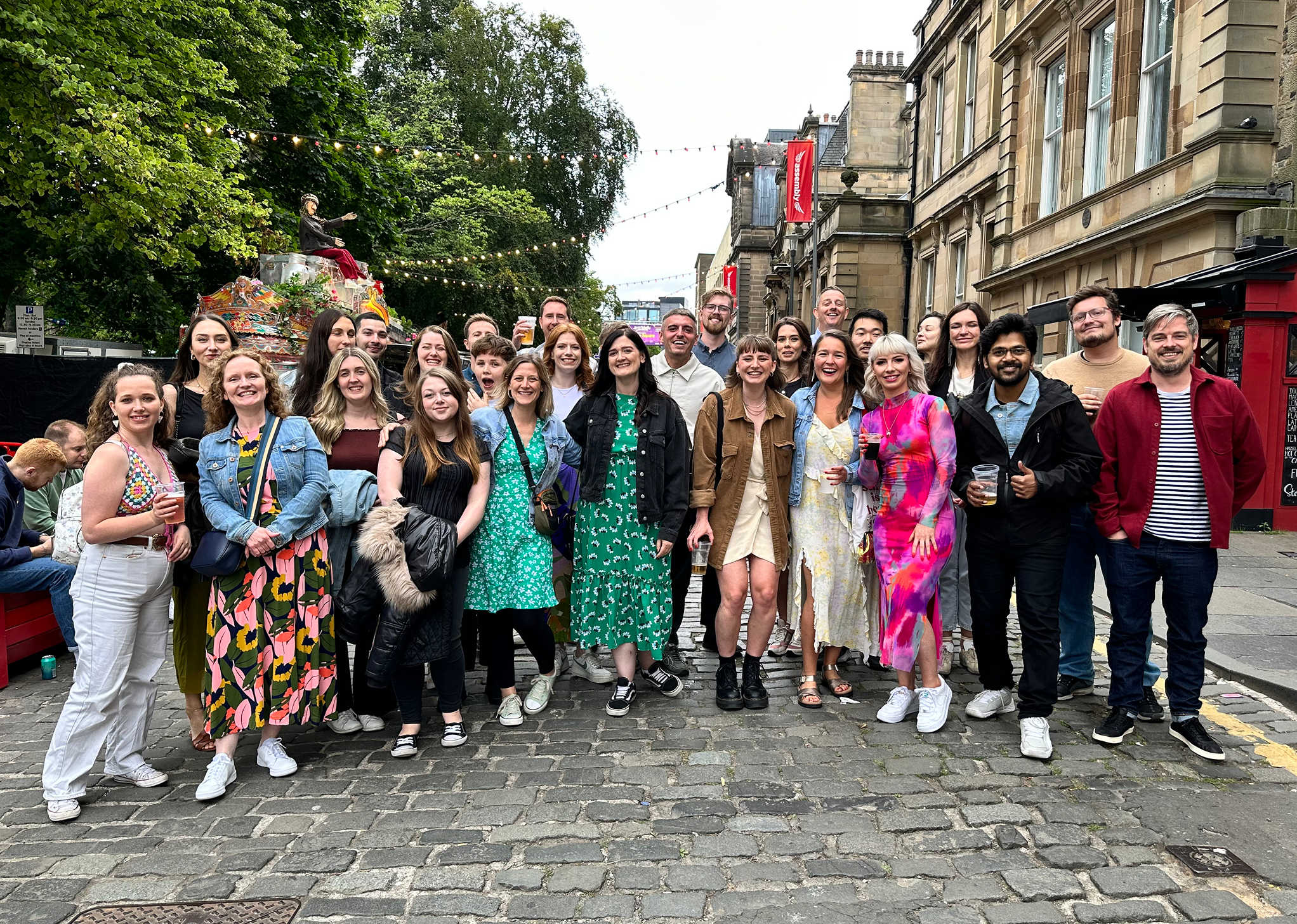 Team 8MS pose for a group photo in the street at the Edinburgh festival.