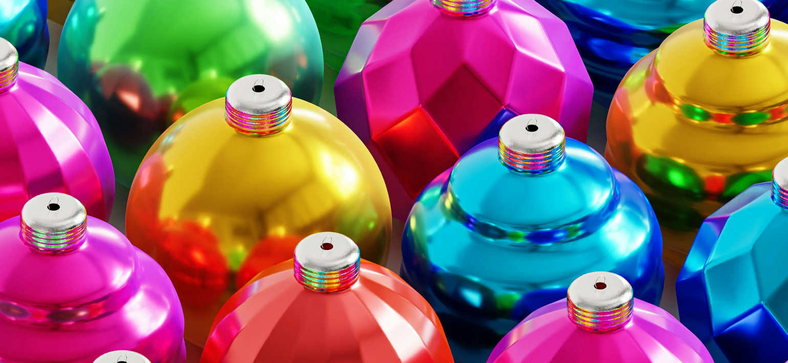 A close up of colourful Christmas baubles.