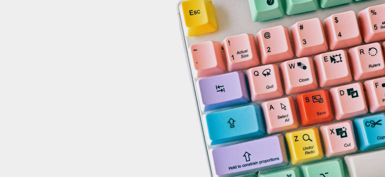 A close up of a keyboard with colourful keys.