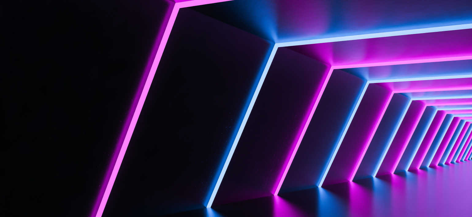 A tunnel with purple and blue striped neon lights.
