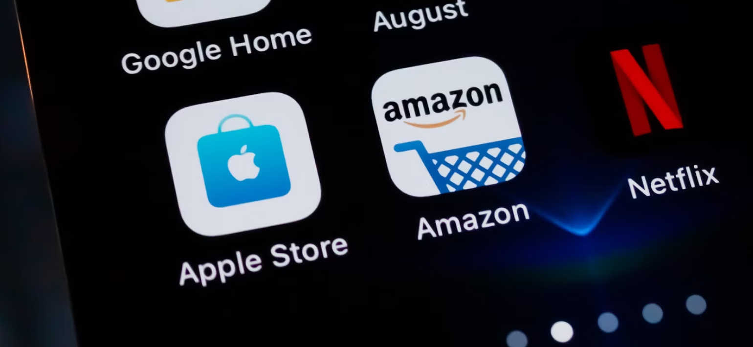A close up of app icons for the Apple Store, Amazon and Netflix.