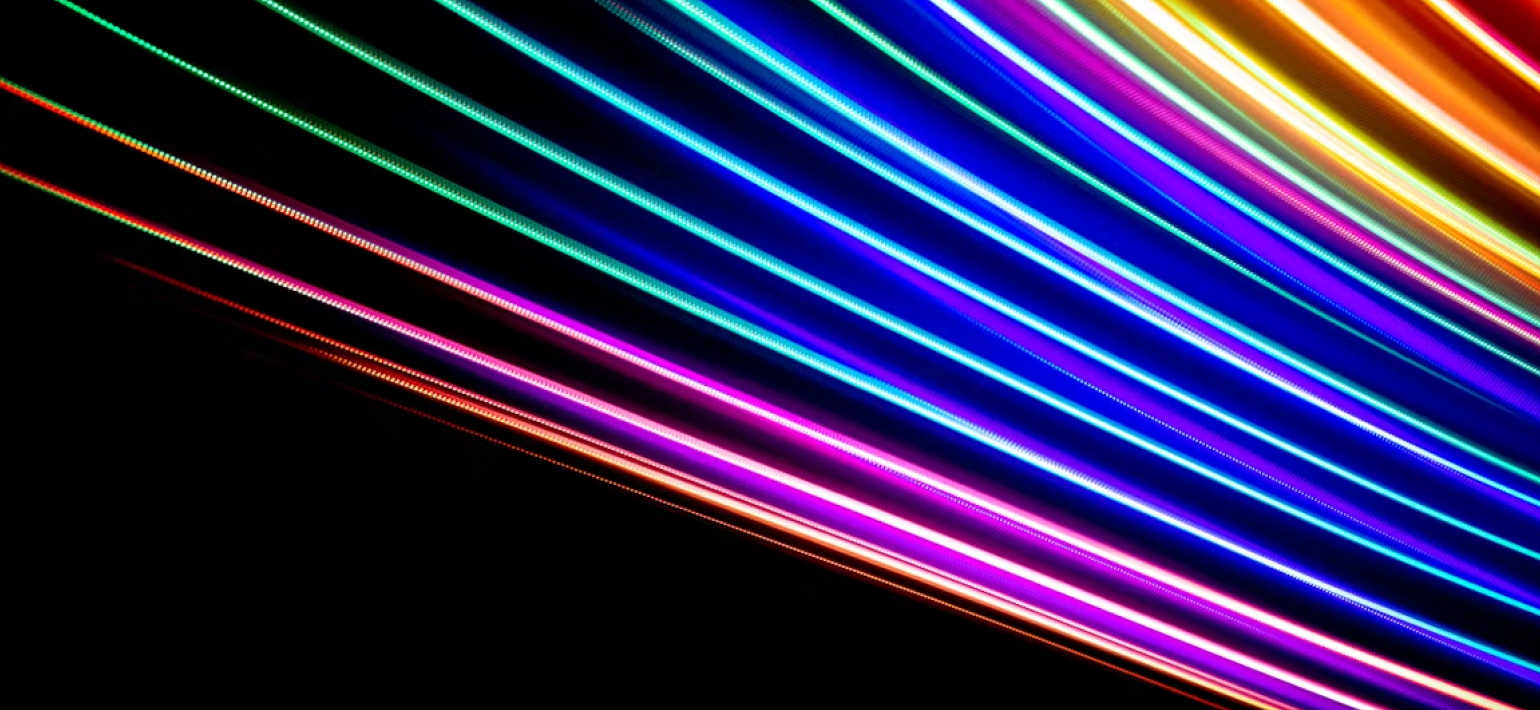 Rows of neon lights against a black background.