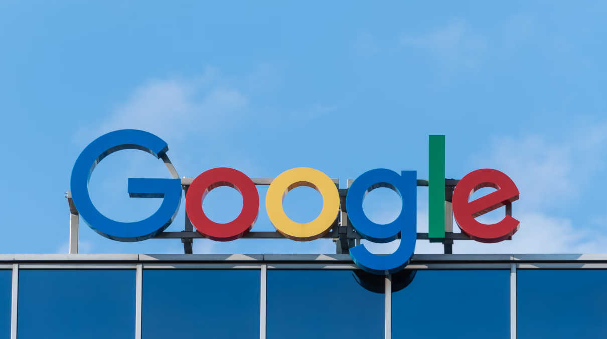 The Google sign on top of a building.