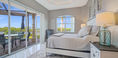 Beautiful Double Bed Covered in White and Black Bedding