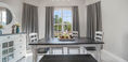 Balck abd White Wooden Dining Table With Beautiful Decoraton on Top