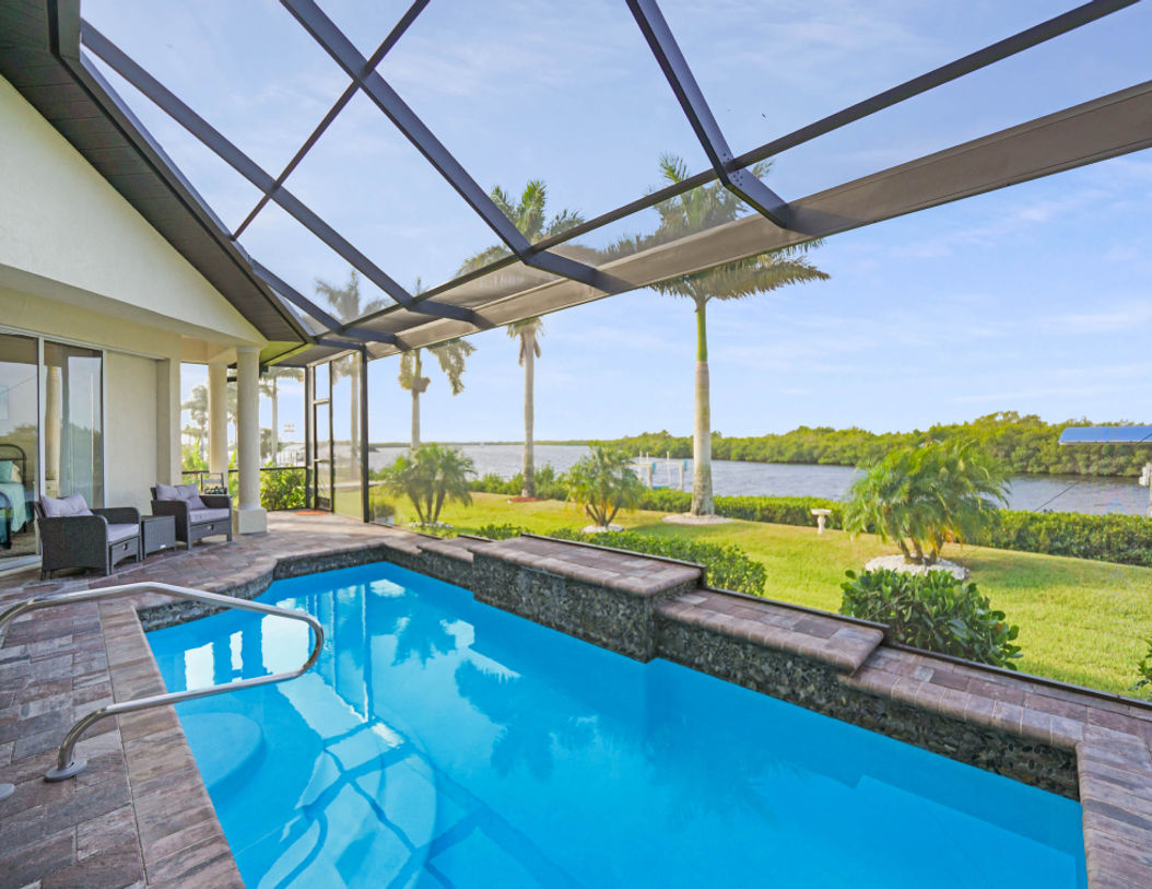 Modern Outdoor Pool With Two Beautiful Outdoor Chairs