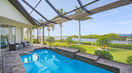 Modern Outdoor Pool With Two Beautiful Outdoor Chairs