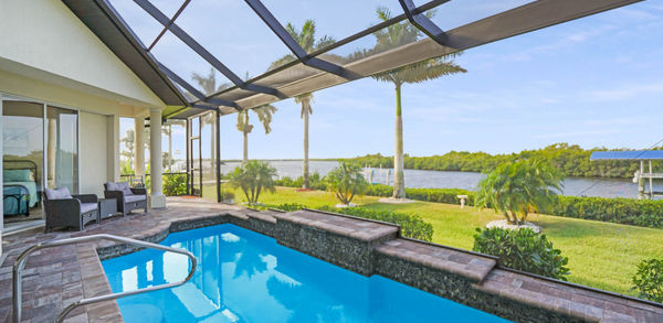 Modern Outdoor Pool With Two Beautiful Outdoor Chairs