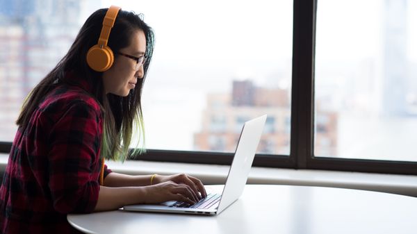 BP.4.3.Girl_with_Headphones_Laptop_112020.jpg