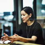 Woman in office talking