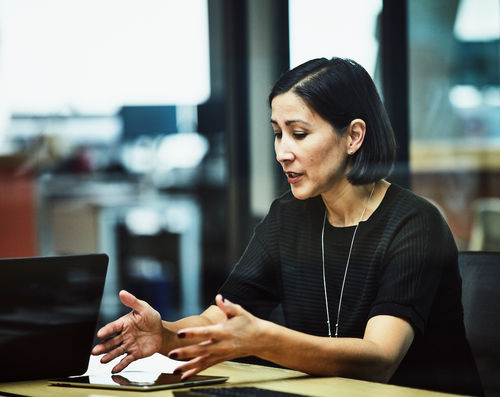 Woman in office talking