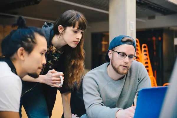 Team discussion with a laptop