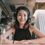 A girl with a headset indoors