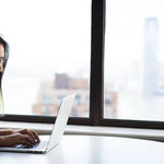 A girl using call center AI technology to connect with customers