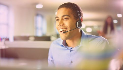 Employee learning what an internet phone service is and how it works