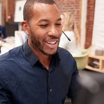 Agents using a VoIP phone to take calls