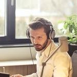 Man using a contact center solution to connect with the company’s customers