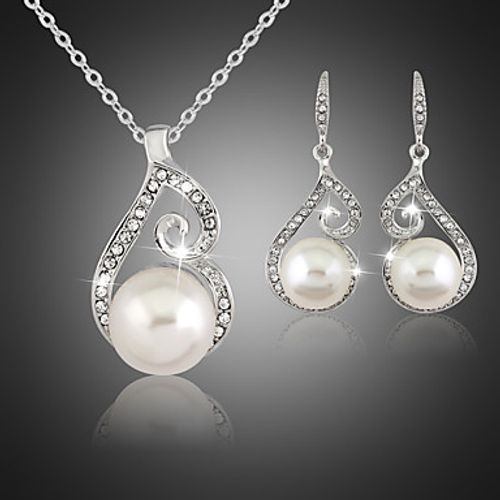 pearl necklace and diamond earrings