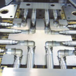 Faulkner Moulds UK Toolmaker production threaded elbow tool production tooling plastic injection mould Toolmaker UK