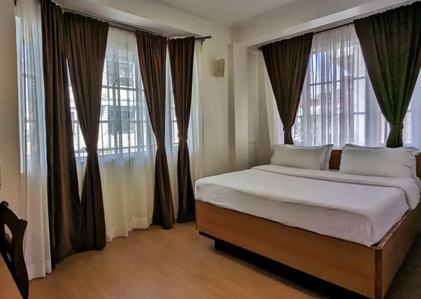 Room interior at Shillong Guest Inn