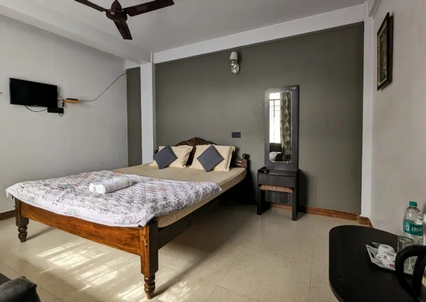 Room interior at Mawlynnong Guest Inn