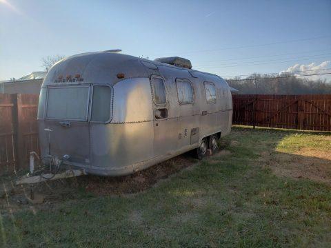 some dents 1975 Airstream Land Yacht camper for sale
