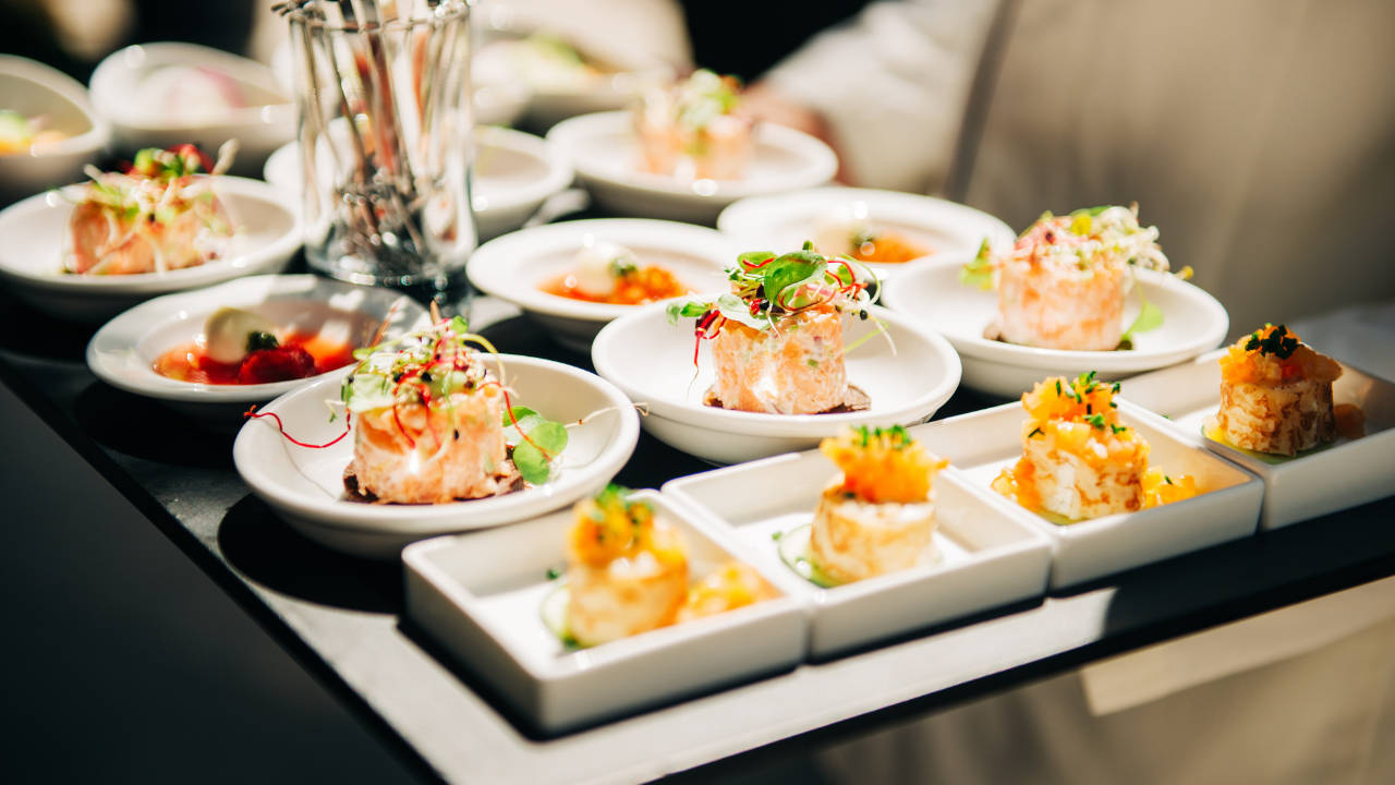 A catering set with sushi rolls.