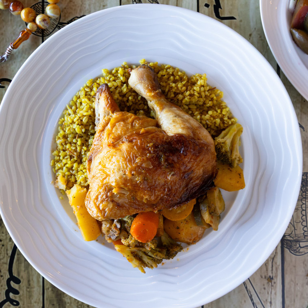 Image-Chicken with rice and salad with hummus and bread