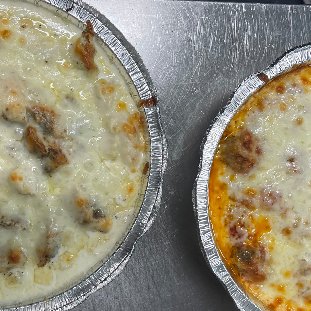 Image-TWO BAKED (CHICKEN OR MEATBALL)PASTA WITH GARLIC BREAD & FREE HALF GALLON SWEET TEA SPECIAL Alfredo is not included