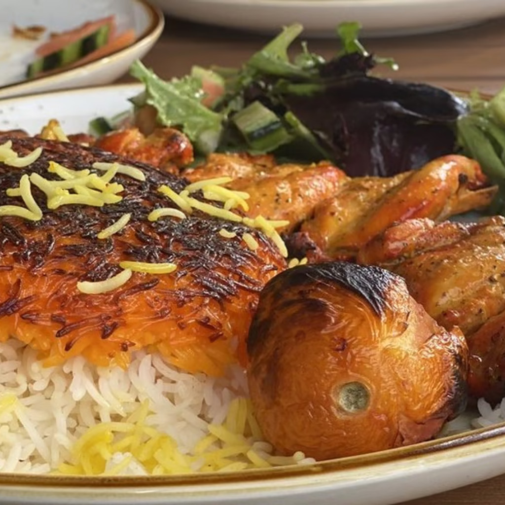 Image-Tahdeeg Rice with Chicken Breast Kabab (Chelo Tahdeeg-e Seeneh Morgh)
