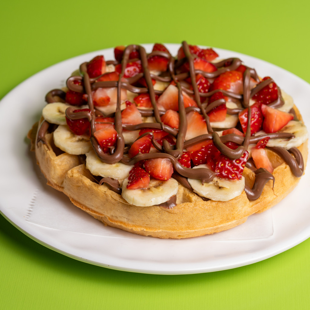 Image-Toasted Waffle with Chocolate, Strawberries and Banana.
