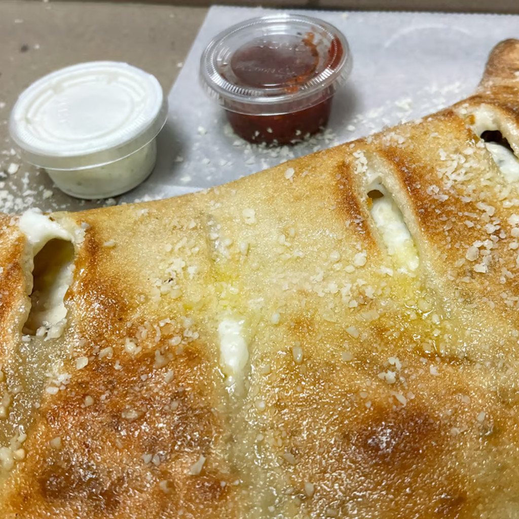 Image-Any Large Stromboli or Calzone & Drink Lunch