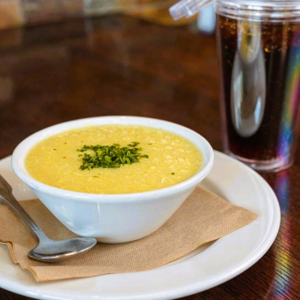 Image-Cup of soup & medium soda.