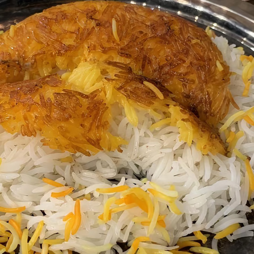 Image-Tahdeeg Rice with Filet Meat Kabaab (Chelo Tahdeeg-e Barg)
