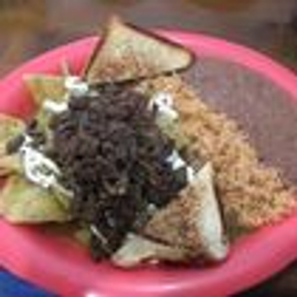 Image-CHILAQUILES WITH CHOPPED ASADA MEAT