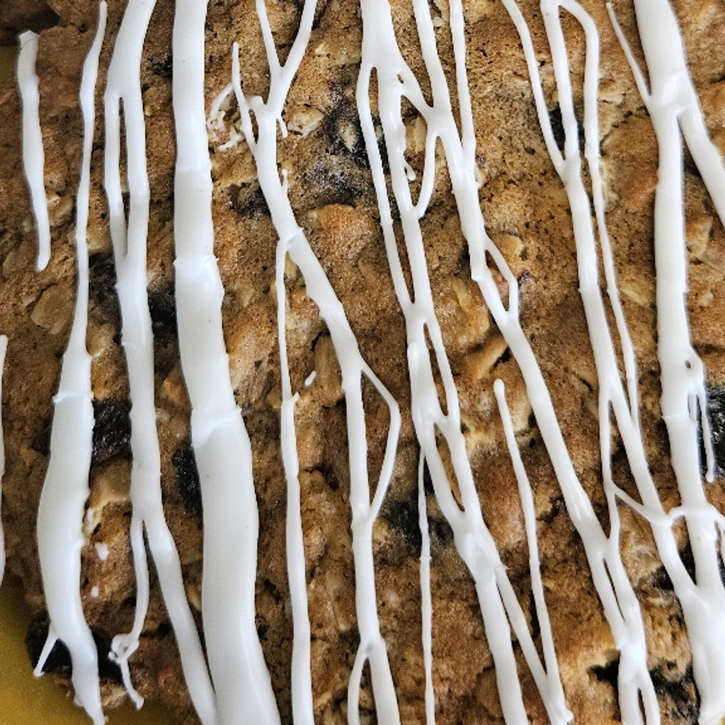 Image-1/4 pound Iced Oatmeal Raisin Cookie