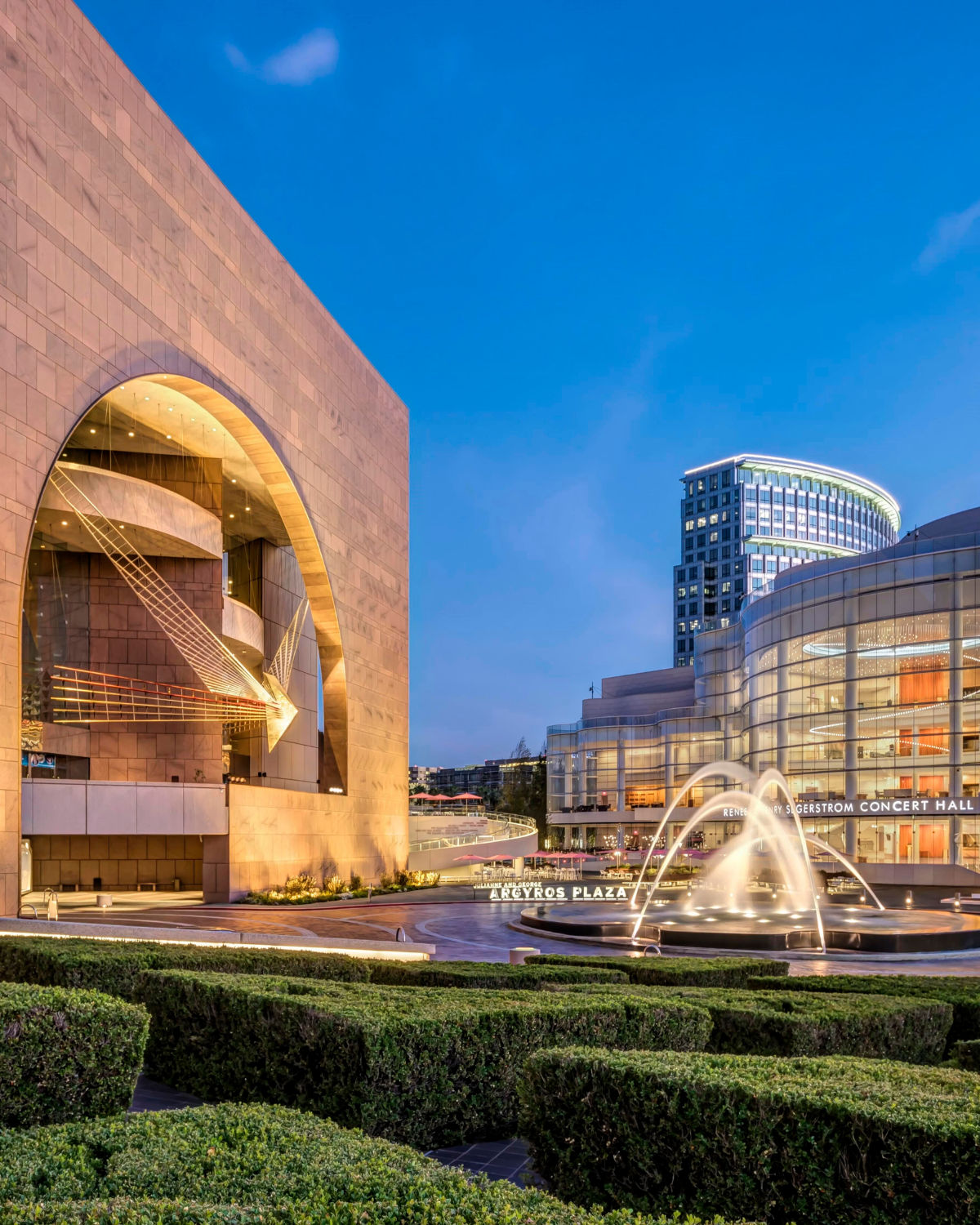 Segerstrom Center for the Arts in Costa Mesa, a modern performing arts venue with a distinctive curved glass exterior.