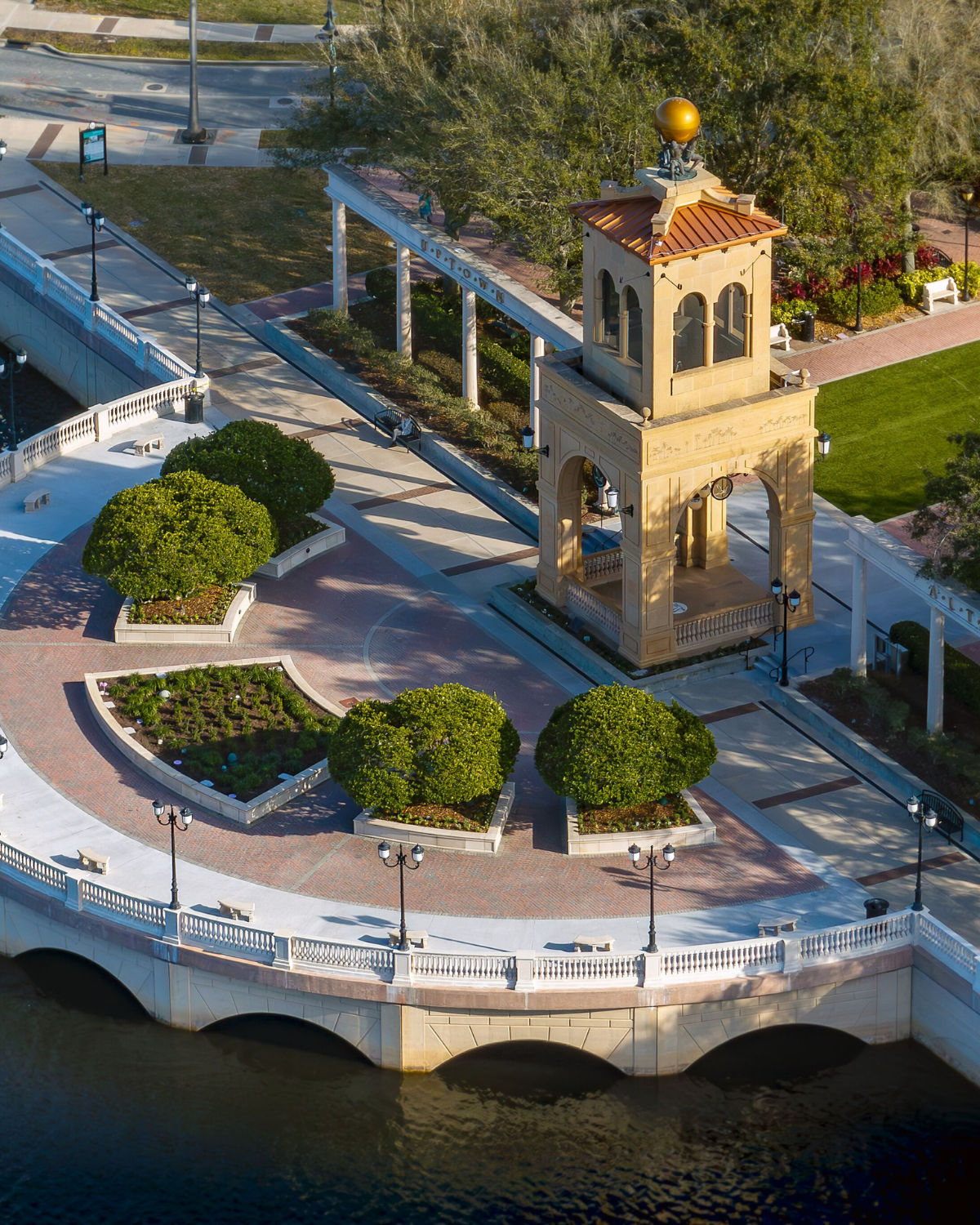 Cranes Roost Park, a lakeside recreational space with walking paths, a plaza with fountains, and an amphitheater for outdoor events and performances