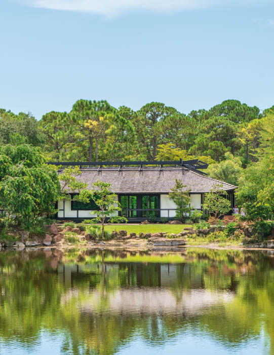 Exterior of the Morikami Museum surrounded by lush tropical greenery in Delray Beach, FL
