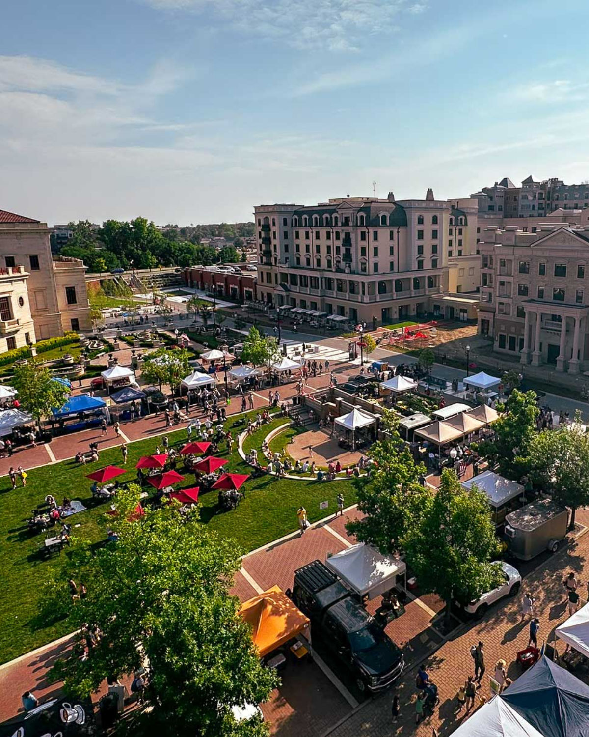 Aerial view of the City Center with a summer fair with tents in Carmel, IN