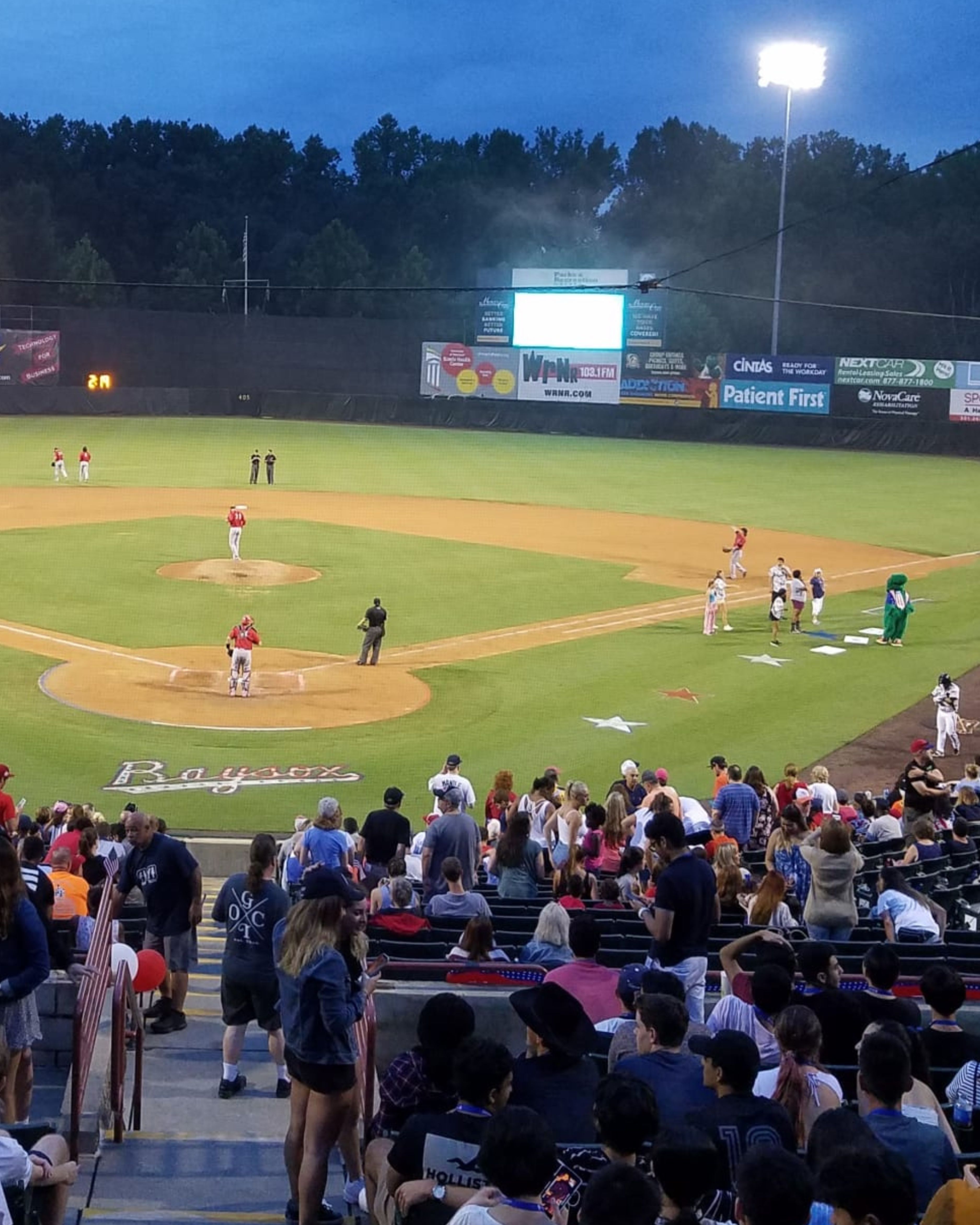 Fans gather at Prince George’s Stadium in Bowie, Maryland, for a Chesapeake Baysox baseball game. Spectators fill the stands while players take the field under bright stadium lights, capturing the family-friendly atmosphere of one of the region’s most popular sports and entertainment venues.