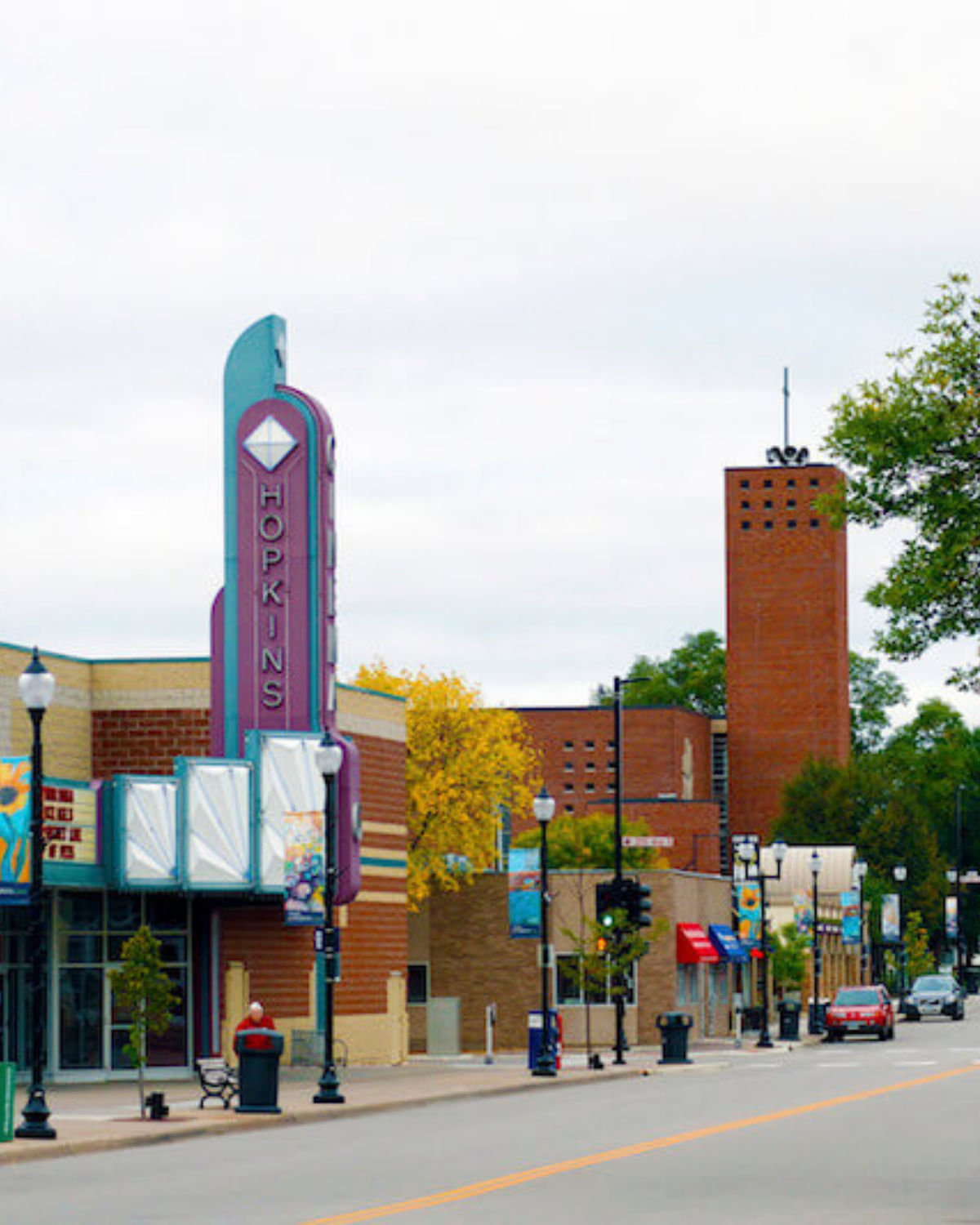 View of Mainstreet with Hopkins Community Cinema and other storefronts in Hopkins, MN